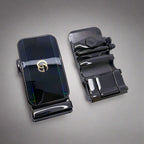 Black belt buckle and strap on a white background