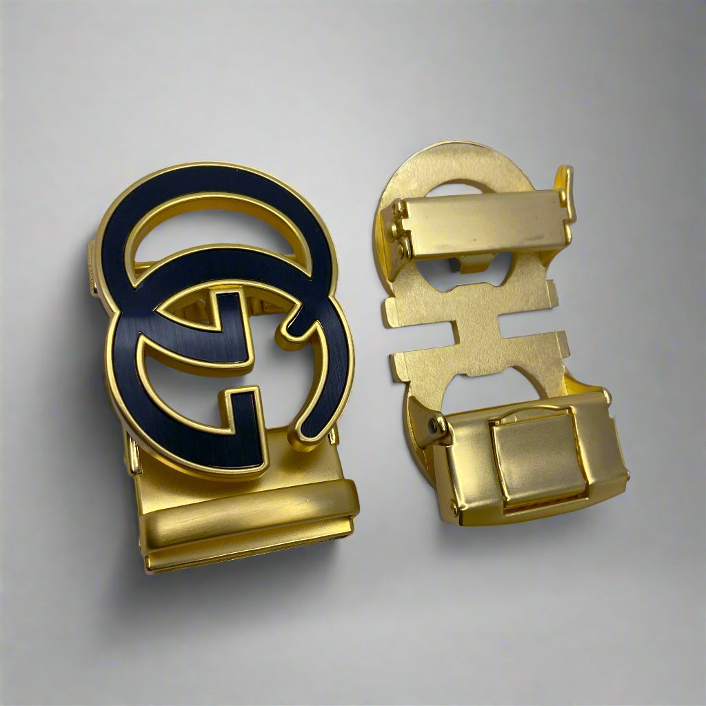 Gold and black belt buckle on a white background